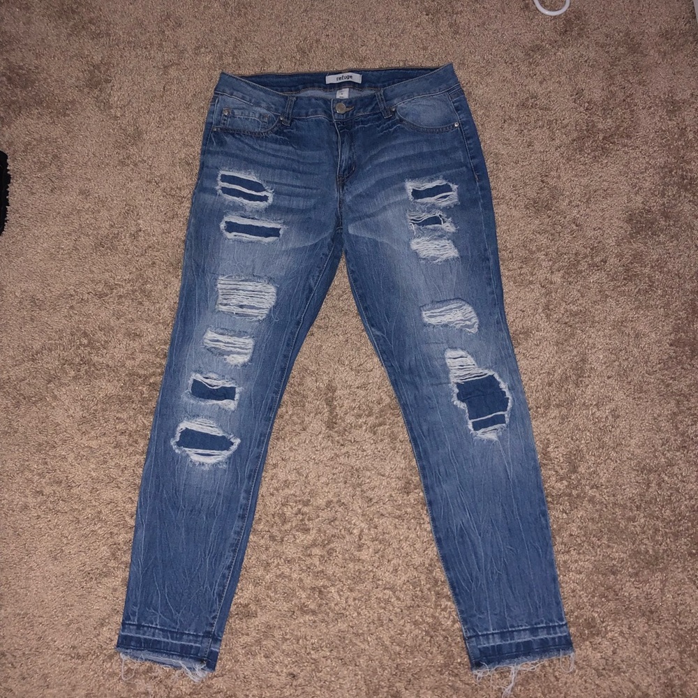 Distressed blue jeans
